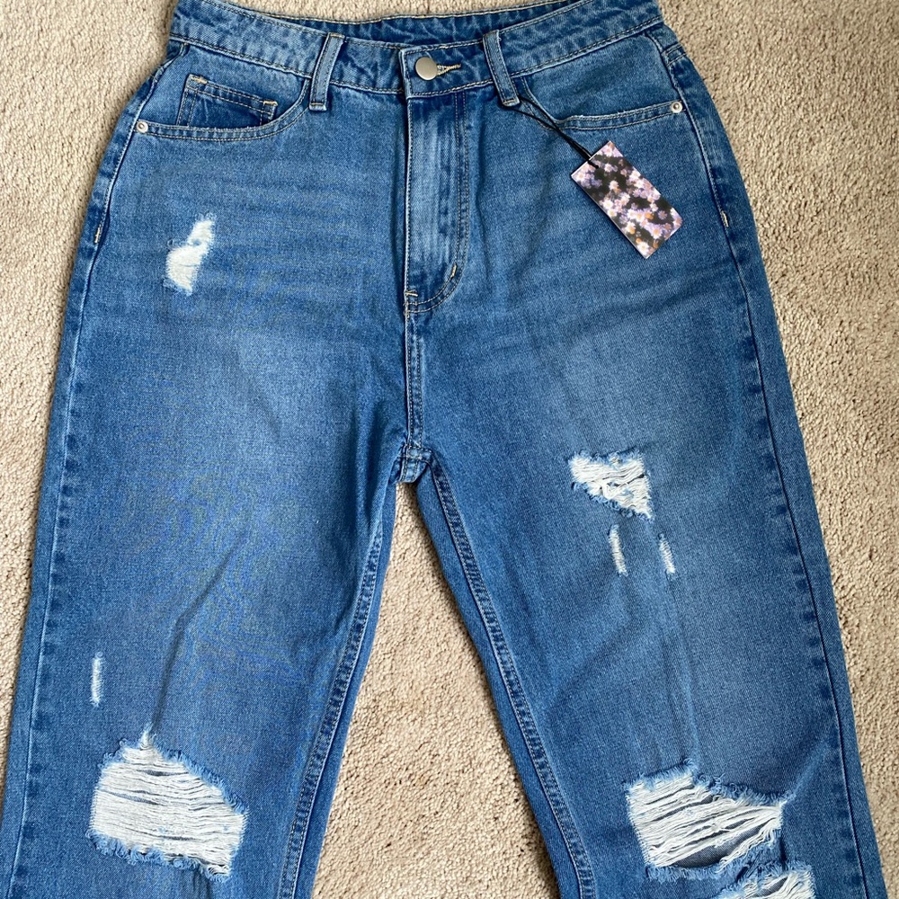 Adorable Cider ripped jeans, new with tags, size M